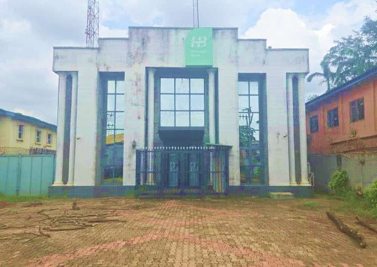 Existing building before works: front elevation and entrance — Sango Otta, Ogun State