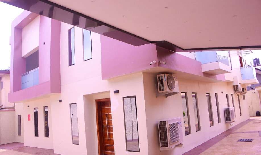 Painted courtyard elevation during works — Gbagada, Lagos