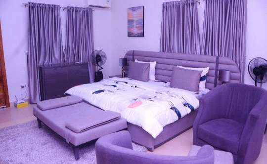 Bedroom with purple upholstery and curtains — Gbagada, Lagos