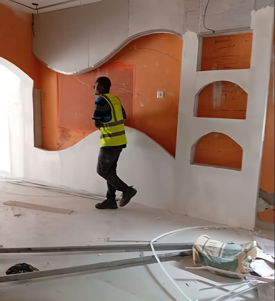 Curved drywall niches during finishing works — Gbagada, Lagos