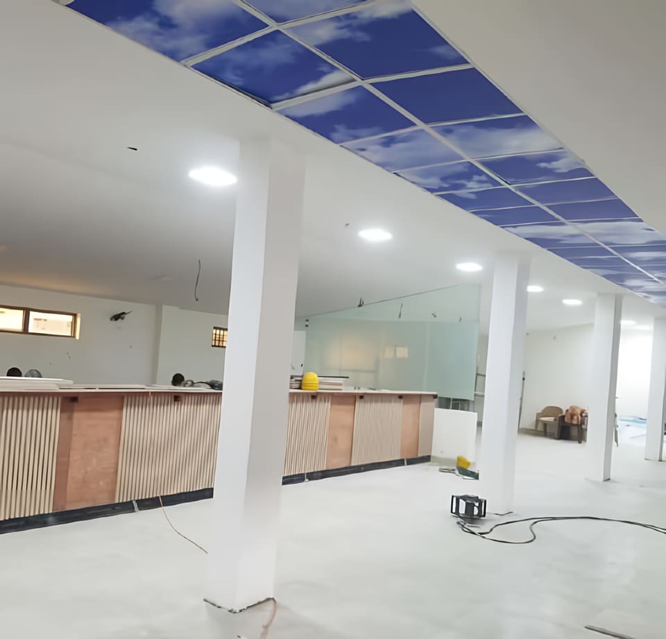 Banking-hall counter, glazing and recessed ceiling lights — HFP Shopping Complex, Lagos