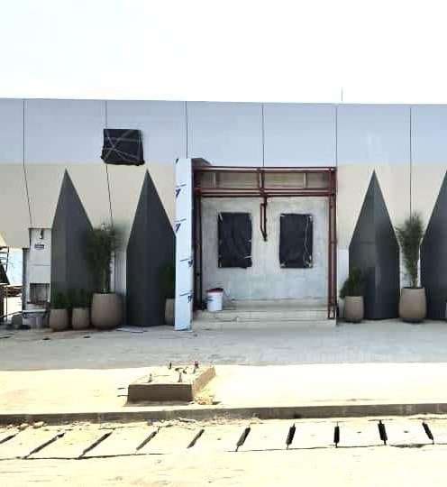 Branch entrance during facade works — HFP Shopping Complex, Lagos